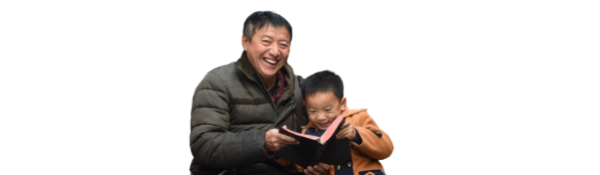 Chinese man with children reading the Bible